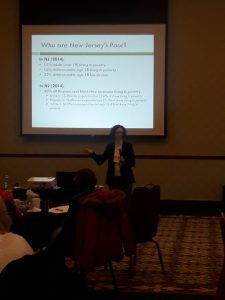 Jennifer Rosen Valverde presented on the social determinants of health, especially poverty.